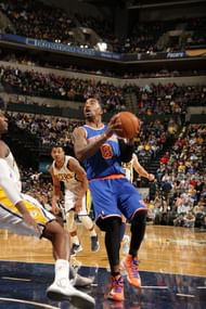 NDIANAPOLIS, IN - FEBRUARY 20: J.R. Smith #8 of the New York Knicks protects the ball during the game between the Indiana Pacers and the NewYork Knicks